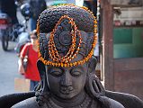 Kathmandu Durbar Square 03 02 Garuda Statue Close Up A garland adorns the head of Garuda in Kathmandu Durbar Square.